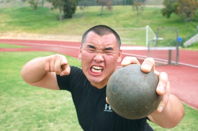 A man throwing a shotput